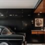 Neatly organized storage space with shelves, tools, and stylish design elements